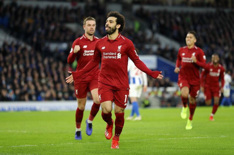 BRIGHTON, ENGLAND - JANUARY 12:  Mohamed Salah of Liverpool celebrates after scoring his team's first goal from the penalty spot during the Premier League match between Brighton & Hove Albion and Liverpool FC at American Express Community Stadium on January 12, 2019 in Brighton, United Kingdom.  (Photo by Bryn Lennon/Getty Images)