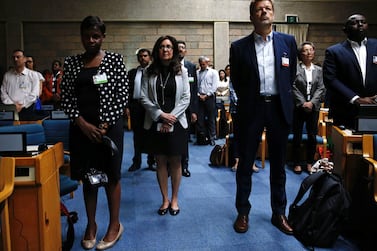 Delegates observe a minute of silence at the United Nations Environment Assembly in Nairobi. Reuters