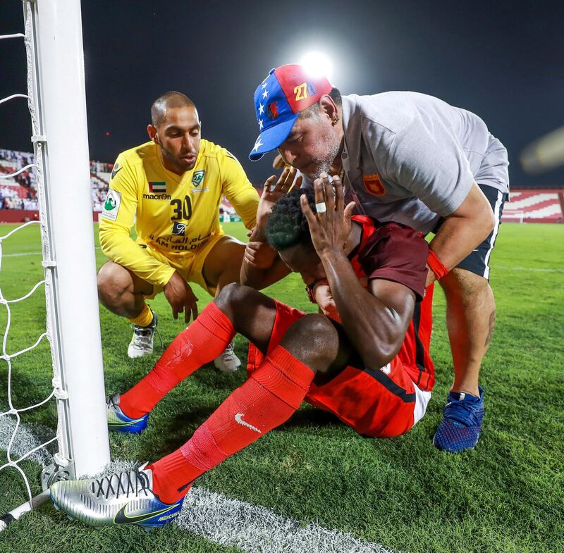 Fujairah, UAE, April 27, 2018.  Final round of 2017/18 First Division. Diego Maradona and Fujairah set to seal promotion to the Arabian Gulf League.   Fujairah v Khorfakkan,
  Diego Maradona comforts Mohamed Khalfan after the match.
Victor Besa / The National
Sports
Reporter: John McAuley.