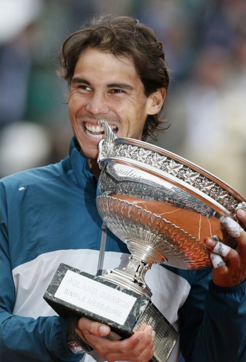 12) Rafael Nadal wins a fourth straight Roland Garros for the second time in his career at the 2013 French Open. AFP