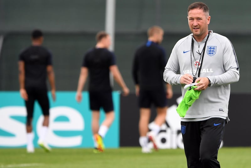 England's assistant coach Steve Holland attends a training session at Spartak Zelenogorsk Stadium in Saint Petersburg on June 19, 2018, during the Russia 2018 World Cup football tournament. / AFP / Paul ELLIS
