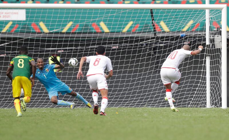Mali's goalkeeper Ibrahima Mounkoro saves Wahbi Khazri's penalty. AP