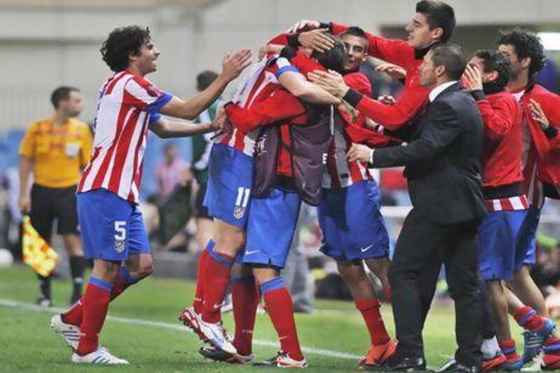 Atletico Madrid are riding high in the Primera Liga, sitting in second place. Andres Kudacki / AP Photo