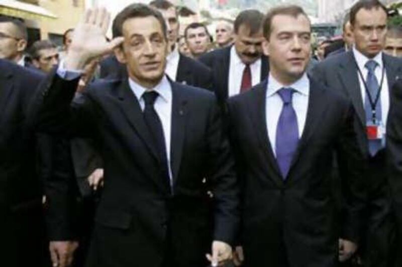 French president Nicolas Sarkozy, left, and Russia's president Dmitry Medvedev walk in the street during the EU-Russia summit, in Nice, France, on Nov 14 2008.