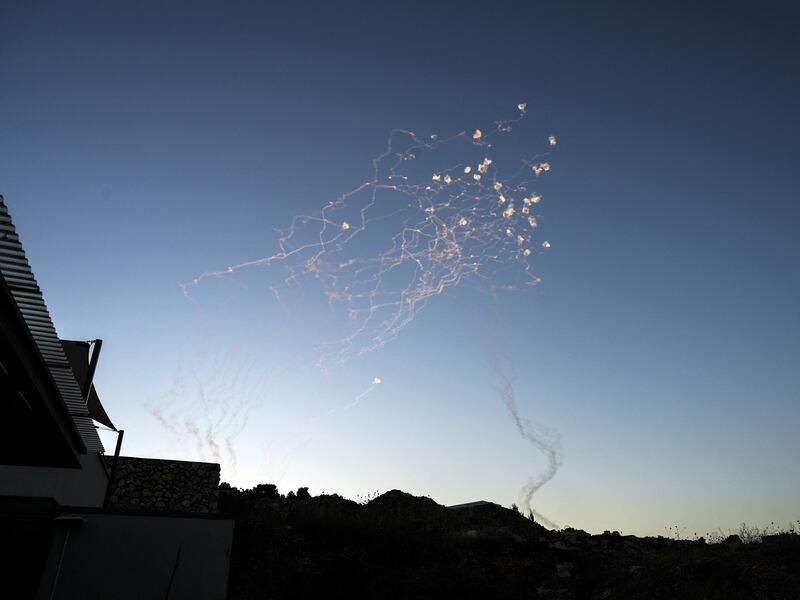 Rockets launched from Lebanon into Israel are intercepted. Reuters