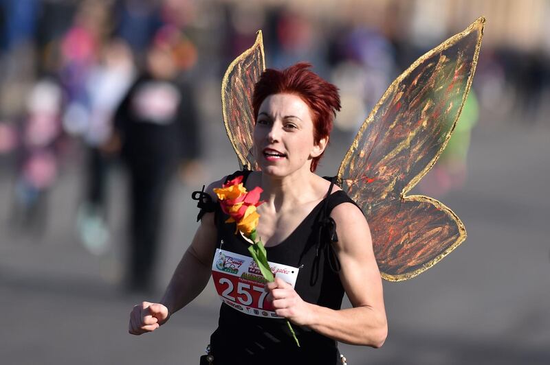 A woman takes part in the "Beauty Run" to mark International Women's Day in the Belarusian capital Minsk.   AFP