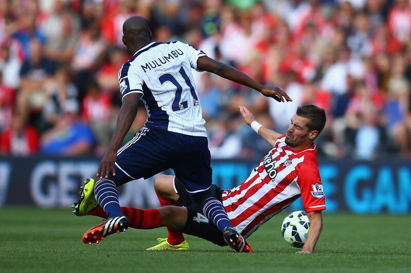 Morgan Schneiderlin of Southampton and Youssuf Mulumbu of West Brom battle for the ball during the Barclays Premier League match between Southampton and West Bromwich Albion at St Mary’s Stadium on August 23, 2014 in Southampton, England. (Photo by Richard Heathcote/Getty Images)