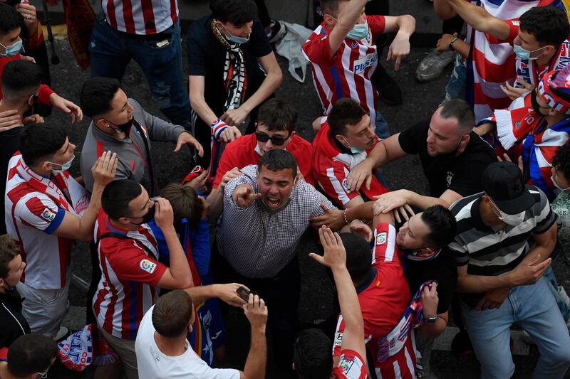 Supporters celebrate at Neptuno square in Madrid. AFP