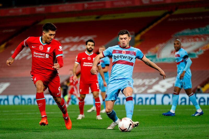 Aaron Cresswell - 6: Reliable. Even when struggling with a groin problem was effective. Fine piece of defending to stop Mane bearing down on goal. AFP