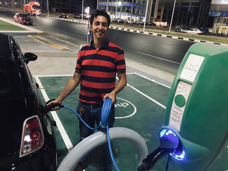 Ayman Mohamed, founder of the Electrified consumer platform, charges his fully electric Fiat 500e at a station in Cairo’s Nasr City. Photo: Ayman Mohamed