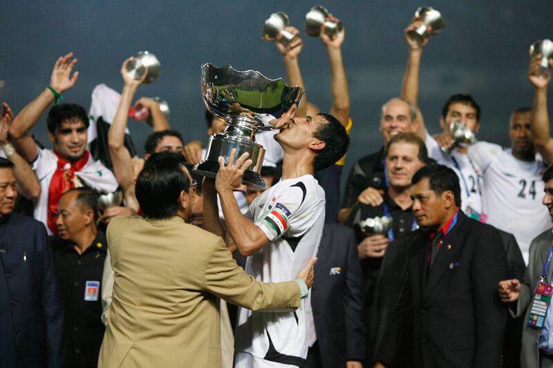 Iraq captain Younis Mahmoud kisses the trophy after their 1-0 win over Saudi Arabia in the 2007 Asian Cup final at the Gelora Bung Karno Stadium in Jakarta on July 29, 2007. Reuters