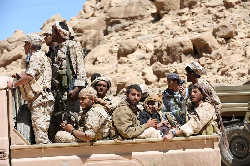 Pro-government army soldiers ride on the back of a truck in Fardhat Nahm area, which has recently been taken by the army from Houthi rebels around 60km from Yemen's capital Sanaa. Ali Owidha / Reuters   