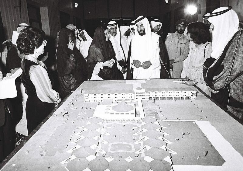Sheikh Zayed looks at a model of the General Women’s Union complex for Abu Dhabi in 1978. Courtesy Al Ittihad