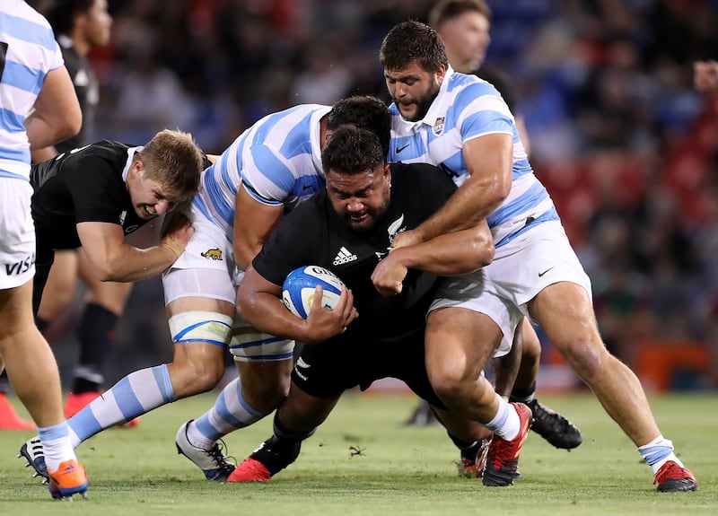 All Blacks' Nepo Laulalais is tackled during the match. Getty