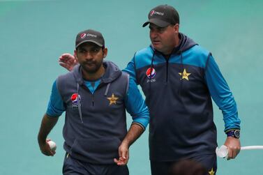 Pakistan coach Mickey Arthur, right, says he has best prepared Sarfaraz Ahmed, left, and his teammates for Sunday's match. Lee Smith / Reuters