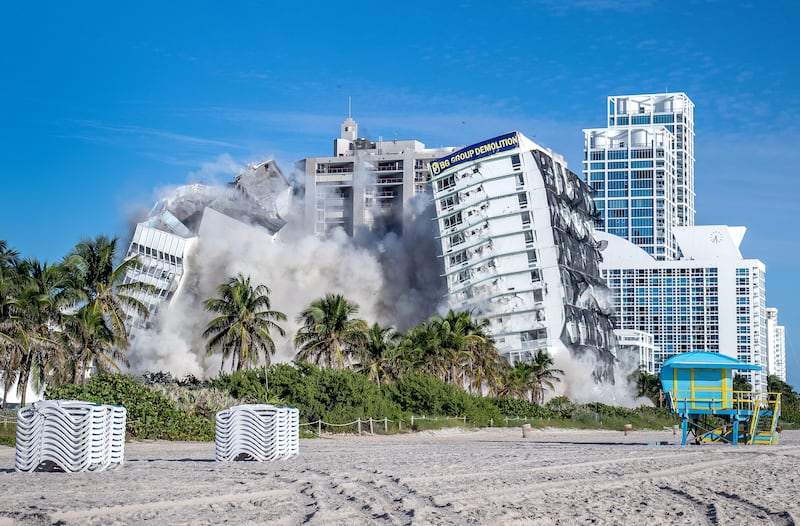 The 17-storey Deauville Hotel in Miami Beach, Florida being demolished.  The historical building, designed by the architect Melvin Grossman and built in 1957, was where The Beatles in 1964 made their second Ed Sullivan Show appearance. EPA