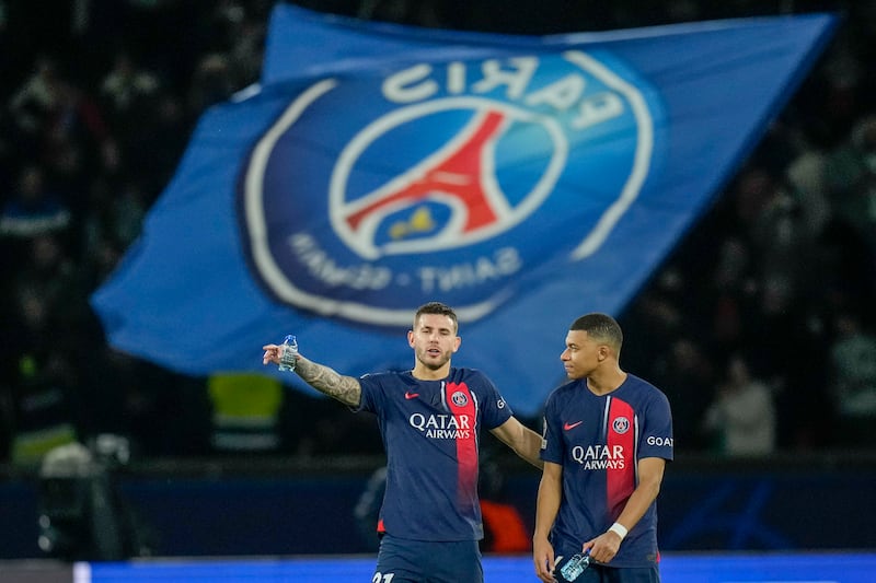 PSG's Kylian Mbappe with Lucas Hernandez after the Champions League last-16 first-leg win over Real Sociedad at the Parc des Princes on February 14, 2024. AP