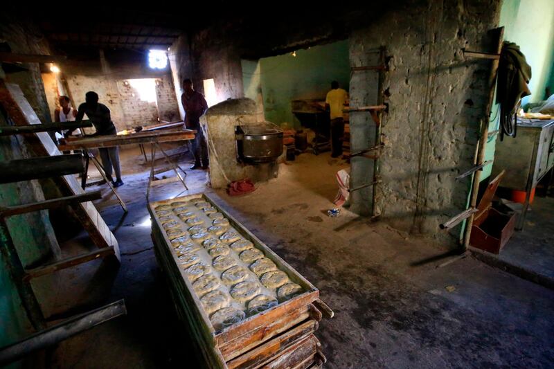 Sudanese bakers prepare bread at a bakery in the town of Atbara, an industrial town 350 kilometres northeast of Sudan’s capital Khartoum.  AFP