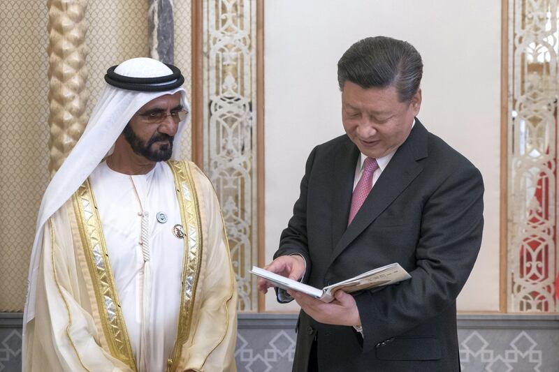 ABU DHABI, UNITED ARAB EMIRATES - July 20, 2018: HH Sheikh Mohamed bin Rashid Al Maktoum, Vice-President, Prime Minister of the UAE, Ruler of Dubai and Minister of Defence (L) presents a gift of his book to HE Xi Jinping, President of China (R), exchange gifts during a reception at the Presidential Palace. 

( Rashed Al Mansoori / Crown Prince Court - Abu Dhabi )
---