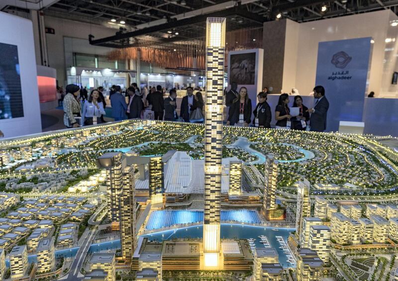 Dubai, United Arab Emirates - October 02, 2018: People at the Mohammed Bin Rashid Al Maktoum city model at Cityscape Global 2018. Tuesday, October 2nd, 2018 at World Trade Centre, Dubai. Chris Whiteoak / The National