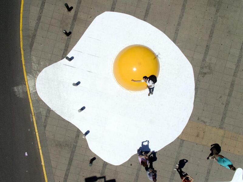 An aerial view of the ‘Art-Eggcident,’ an installation by Dutch artist Henk Hofstra in Santiago, Chile, taken on November 9, 2016. The artwork is part of the ‘Hecho en Casa (Made in Home) urban art festival running in Santiago this week. Sebastian Silva / EPA