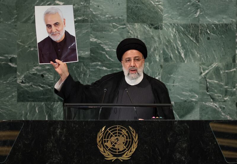 Iran's President Ebrahim Raisi pays tribute to Quds Force Commander Gen Qassem Suleimani, who was killed in a US attack, as he addresses the General Assembly. Reuters