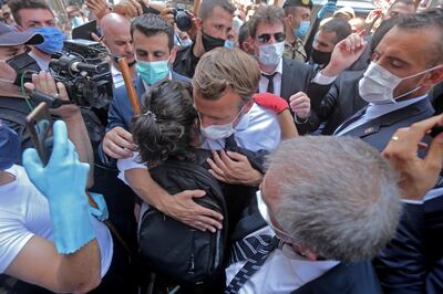 The French leader was warmly received when he toured the city after the disaster. AFP