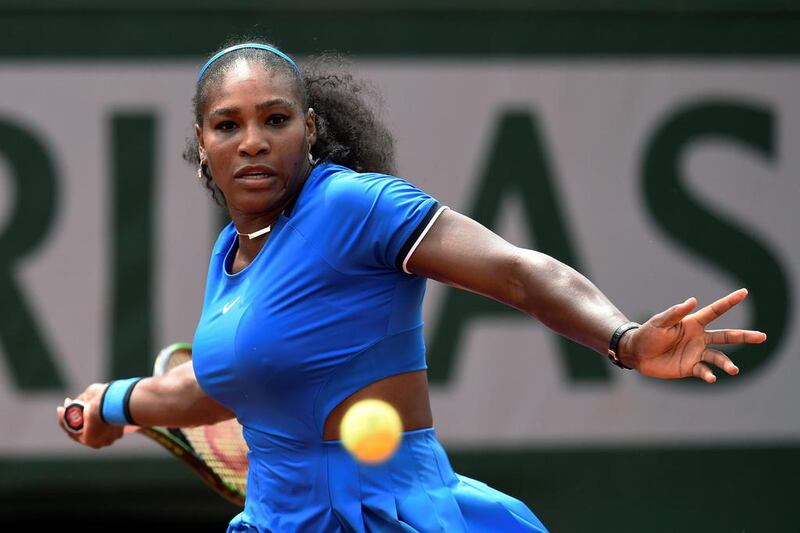 US player Serena Williams returns the ball to France’s Kristina Mladenovic during their women’s third round match at the Roland Garros 2016 French Tennis Open in Paris on May 28, 2016. / AFP / MIGUEL MEDINA