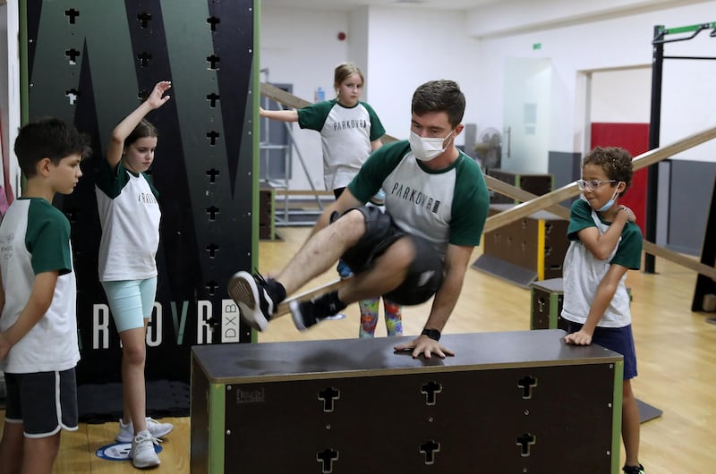 DUBAI, UNITED ARAB EMIRATES , November 4 – 2020 :- Harry Murden, British Spiderman teaching kids how to parkour at the Parkour DXB in Al Quoz in Dubai. (Pawan Singh / The National) For POAN. Story Sarwat 