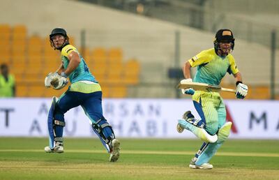 ABU DHABI , UNITED ARAB EMIRATES, October 05, 2018 :- Colin Ingram ( left ) and Ryan Higgins ( right ) of Boost Defenders running between the wickets during the Abu Dhabi T20 cricket match between Multiply Titans  vs Boost Defenders held at Zayed Cricket Stadium in Abu Dhabi. ( Pawan Singh / The National )  For Sports. Story by Amith