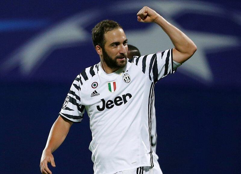 Juventus striker Gonzalo Higuain celebrates after scoring against Dinamo Zagreb. Antonio Bronic / Reuters