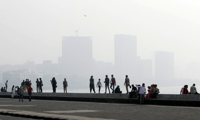 The sky is filled with smog above Marine Drive in Mumbai, India. AP Photo
