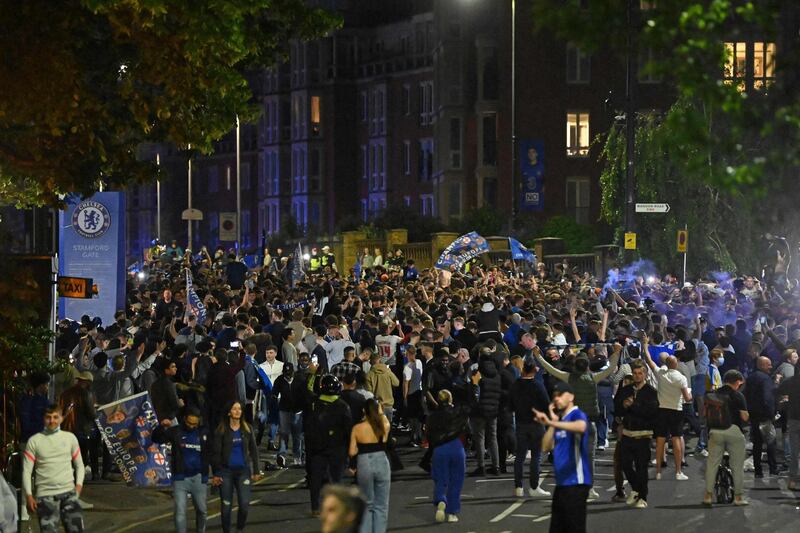 Chelsea supporters celebrate in streets surrounding their Stamford Bridge stadium in London their Champions League victory. AFP