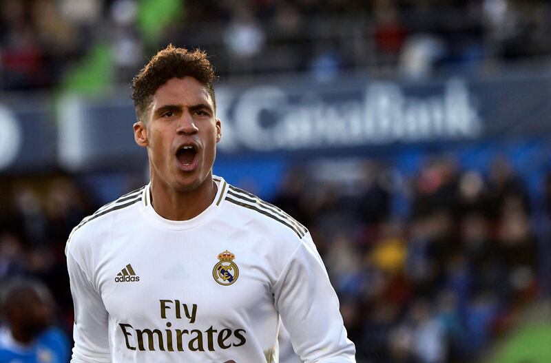 Real Madrid's French defender Raphael Varane celebrates his goal during the Spanish league football match between Getafe CF and Real Madrid CF at the Col. Alfonso Perez stadium in Getafe on January 4, 2020. / AFP / OSCAR DEL POZO
