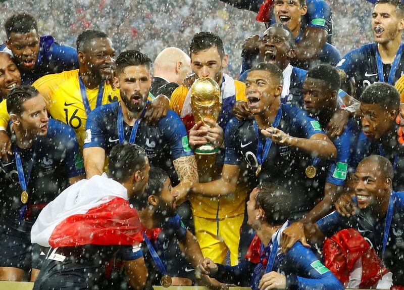 France's Hugo Lloris kisses the trophy as they celebrate after winning the World Cup. Reuters