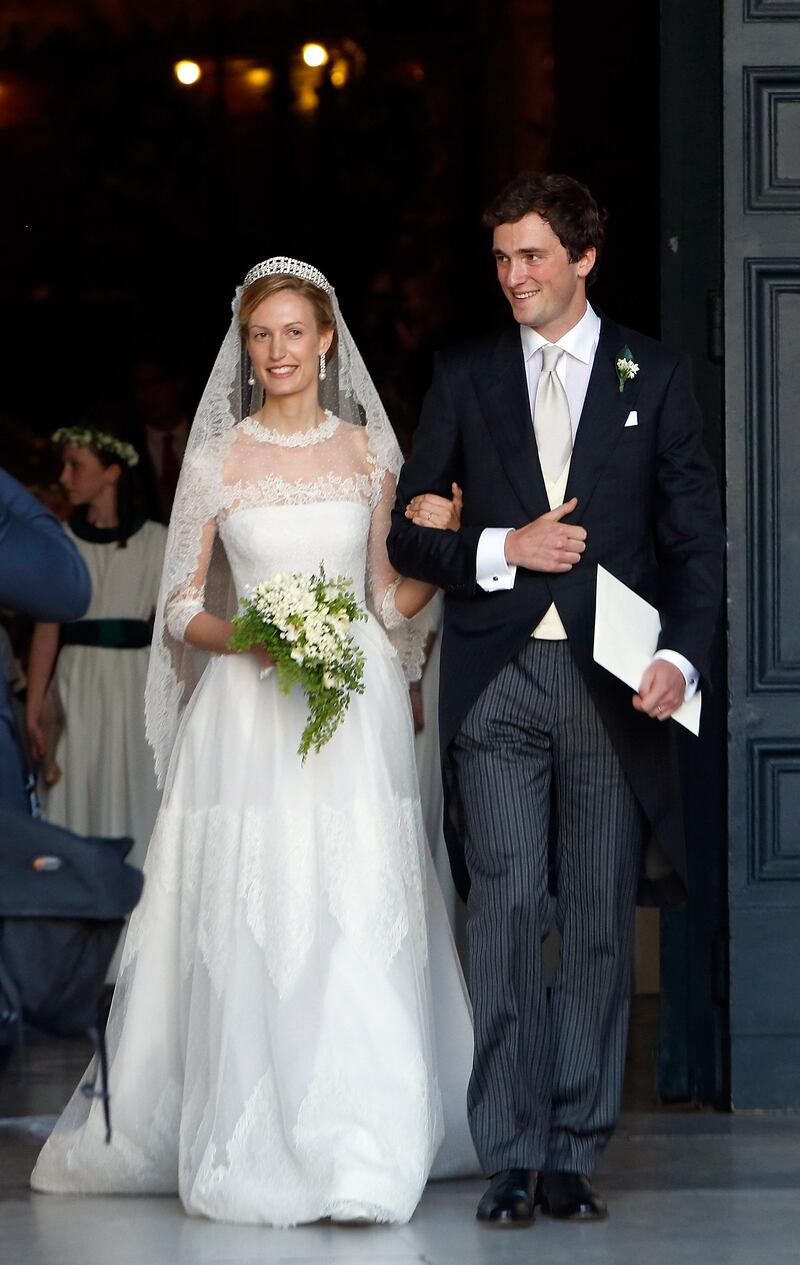 ROME, ITALY - JULY 05:  Prince Amedeo of Belgium and Princess Elisabetta Maria celebrate after their wedding ceremony at Basilica Santa Maria in Trastevere on July 5, 2014 in Rome, Italy.  (Photo by Elisabetta Villa/Getty Images)