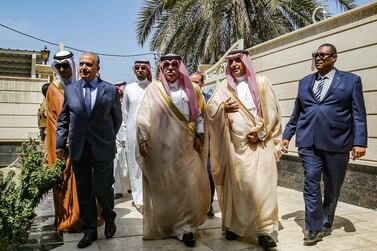 Iraqi Foreign Minister Mohammed Al Hakim, left walks beside Saudi Trade Minister Majed Al Kassabi at the new Saudi consulate in Baghdad on April 4, 2019. AFP