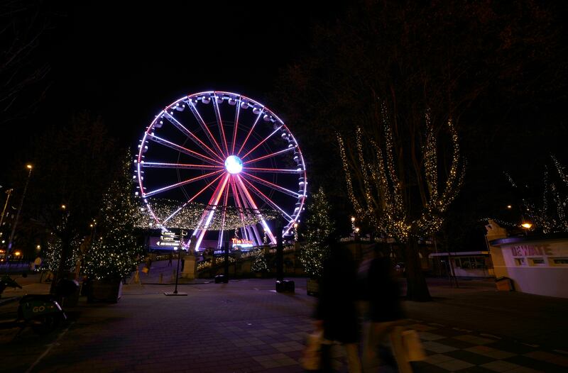 A Ferris wheel in the historic centre of Antwerp, Belgium. The government will meet to decide whether new Covid-19 measures will be taken. AP