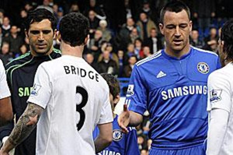 The non-shake that gripped a nation: John Terry's hand is still out as Wayne Bridge moves on.