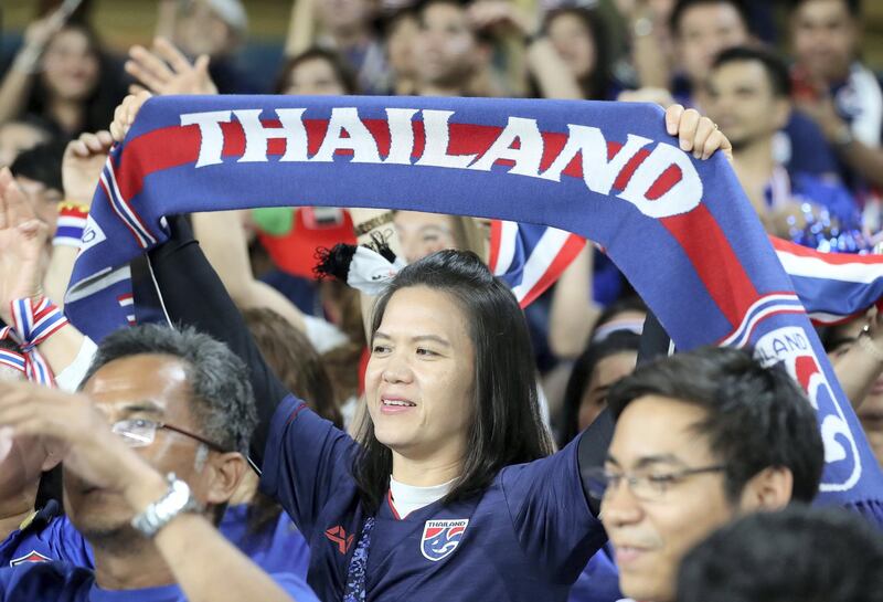 Al Ain, United Arab Emirates - January 14, 2019: Thailand fans before the game between UAE and Thailand in the Asian Cup 2019. Monday, January 14th, 2019 at Hazza Bin Zayed Stadium, Al Ain. Chris Whiteoak/The National