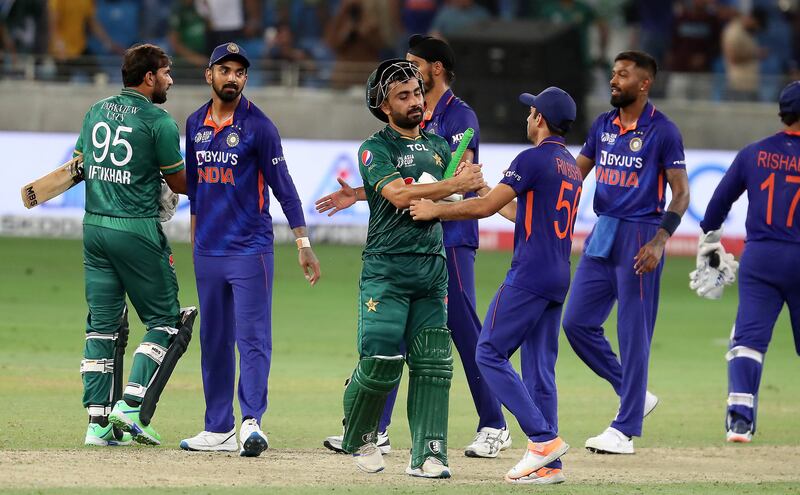 Players shake hands at the end of the game. Pawan Singh / The National