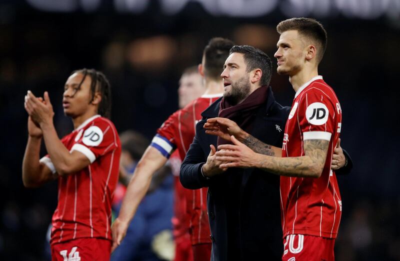 Soccer Football - Carabao Cup Semi Final First Leg - Manchester City vs Bristol City - Etihad Stadium, Manchester, Britain - January 9, 2018   Bristol City manager Lee Johnson after the match with Jamie Paterson      Action Images via Reuters/Carl Recine    EDITORIAL USE ONLY. No use with unauthorized audio, video, data, fixture lists, club/league logos or "live" services. Online in-match use limited to 75 images, no video emulation. No use in betting, games or single club/league/player publications.  Please contact your account representative for further details.