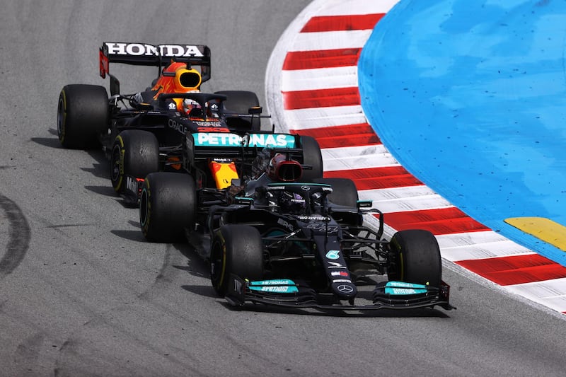 Lewis Hamilton of Mercedes leads Max Verstappen of Red Bull at Circuit de Catalunya. Getty