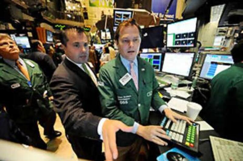William Brazer, right, of Lehman Brothers MarketMakers, and Anthony Campagna of Speer, Leeds, Kellogg work on the floor of the New York Stock Exchange on Sept 19 2008. Wall Street extended a huge rally as investors stormed back into the market, relieved that the government plans to rescue banks from billions of dollars in bad debt.