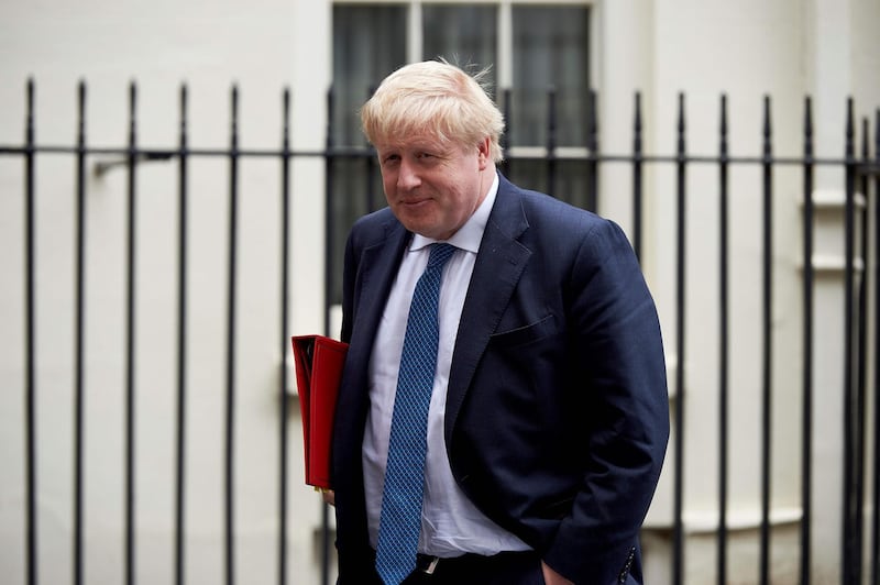 (FILES) In this file photo taken on April 10, 2018 Britain's Foreign Secretary Boris Johnson leaves from 10 Downing street after attending a National Security Council meeting in London. British Foreign Secretary Boris Johnson has been caught on tape predicting a "meltdown" in Brexit talks and musing admiringly how US President Donald Trump might handle them. In his latest indiscreet remarks likely to embarrass Prime Minister Theresa May, Johnson said the government was reaching a phase in negotiations "where we are much more combative with Brussels". / AFP / NIKLAS HALLE'N
