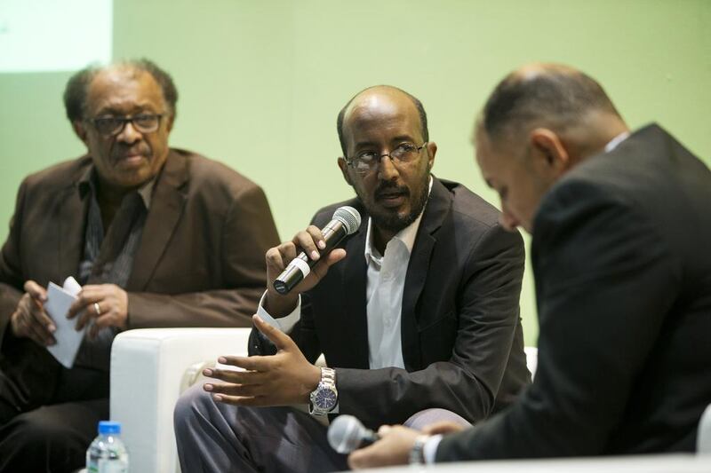 Sudanese novelists, from left, Amir Taj Al-Sir and Hammour Ziada at the book fair. Christopher Pike / The National