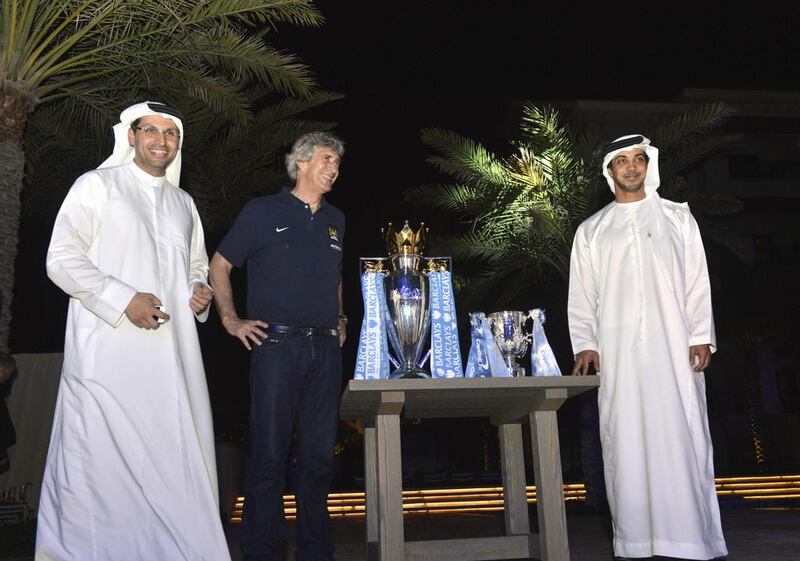 Sheikh Khaldoon al Mubarak, left, Mr Pellegrini and Sheikh Mansour.