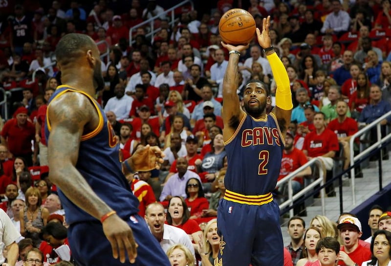 Kyrie Irving shown attempting a jump shot against the Atlanta Hawks during last season's NBA play-offs. Kevin C Cox / Getty Images / AFP / May 20, 2015