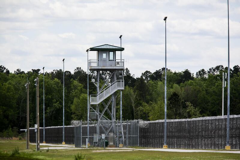 (FILES) In this file photo taken on April 16, 2018 the Lee Correctional Institution, in Bishopville, South Carolina, after an overnight riot killed seven while also injuring seventeen other inmates. - US prisoners on August 21, 2018 declared a nationwide strike demanding changes to correctional institutions including living conditions, pathways to parole and voting rights restoration. The US incarceration rate is the world's highest: about 2.2 million people were behind bars at the end of 2016, a figure the American Civil Liberties Union says represents approximately one-fifth of the global population of prisoners. (Photo by Logan Cyrus / AFP)