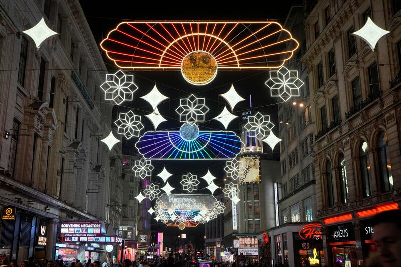 Ramadan lights are lit to celebrate the coming start of the holy month at Piccadilly Circus, London, on March 7. AP